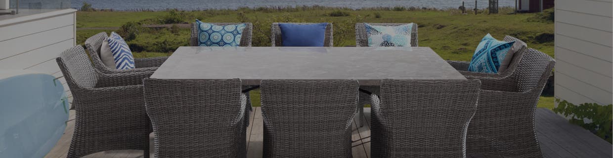 Stone Table With Wicker Chairs